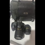 Nikon D3300 DX-format DSLR Kit w/0.709-2.165 in DX VR II & 2.165-7.874 in DX VR II Zoom Lentes y estuche (negro)